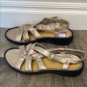 Clark’s unstructured leather braided sandals. 10W.
